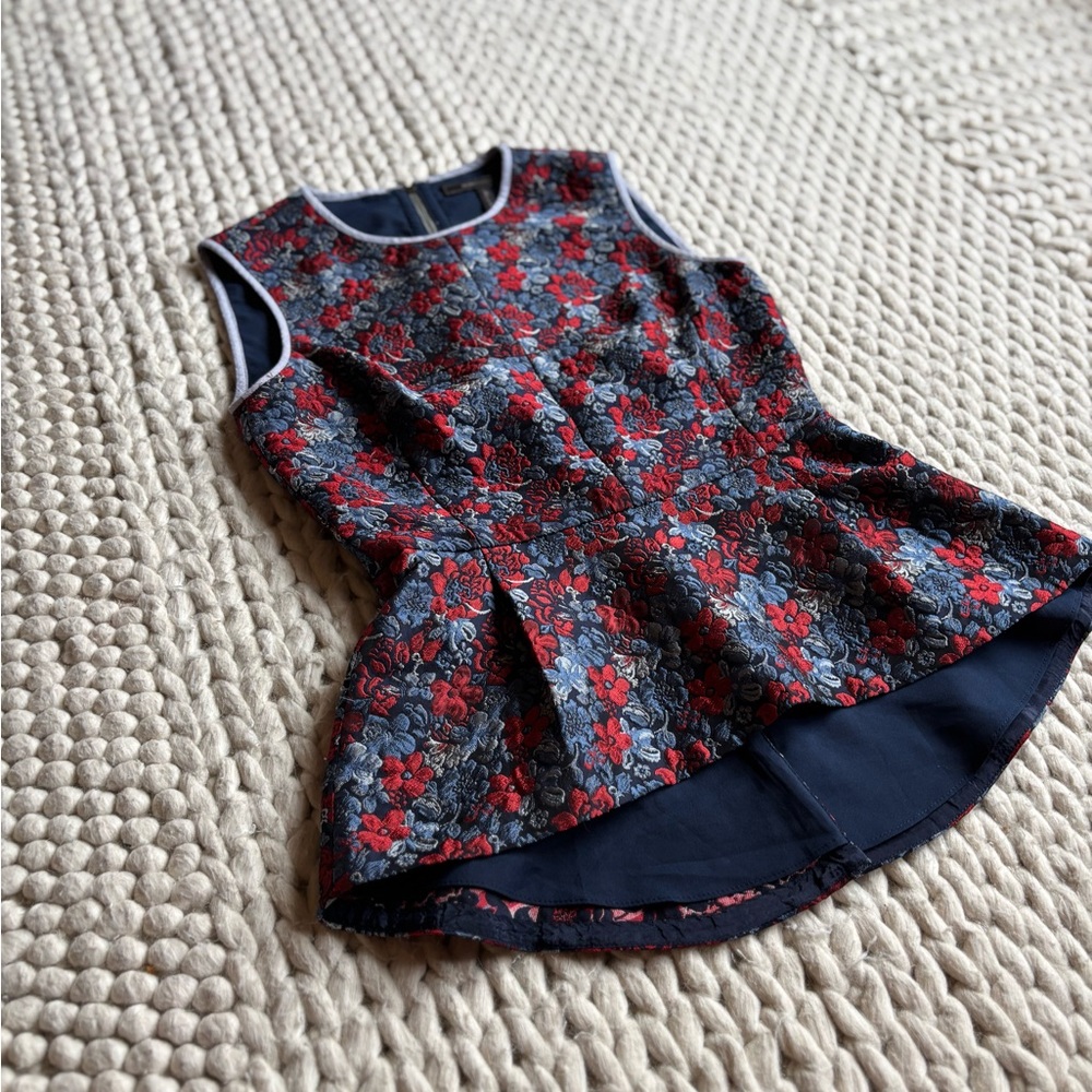 Sleeveless Peplum Top